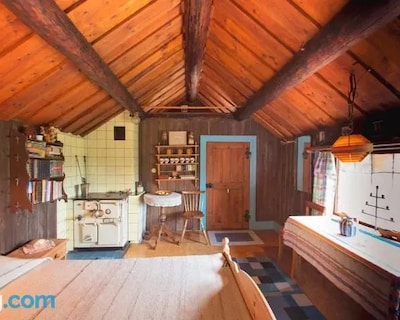 Egen stuga med delat badrum